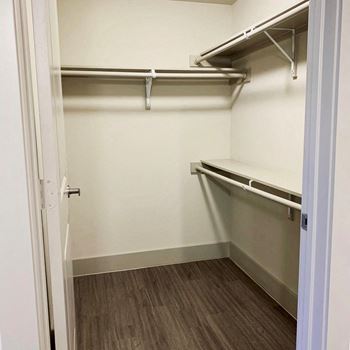 walk in closet at mela luxury apartments